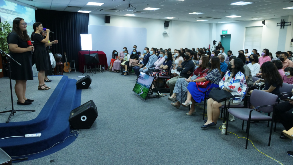 congregation of the in a Filipino Adventist church in Singapore