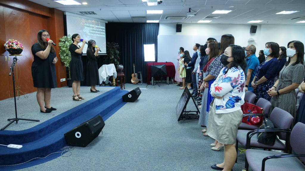 worship and song service at the Filipino Adventist church in Singapore